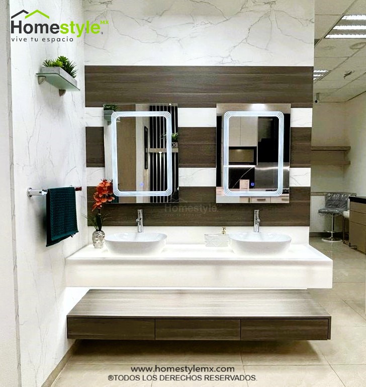 Mueble de baño en forma lineal. Diseñado en Melamina Linosa Ceniza y Melamina Marmára. Con una cubierta de Superficie Solida Luminous White.