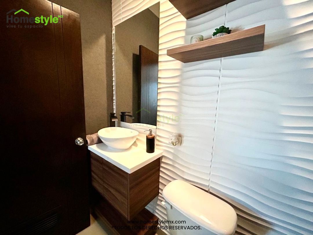 Mueble de baño en Melamina Nogal Terracota con repisa y cubierta de Superficie Sólida en color Frosty White.